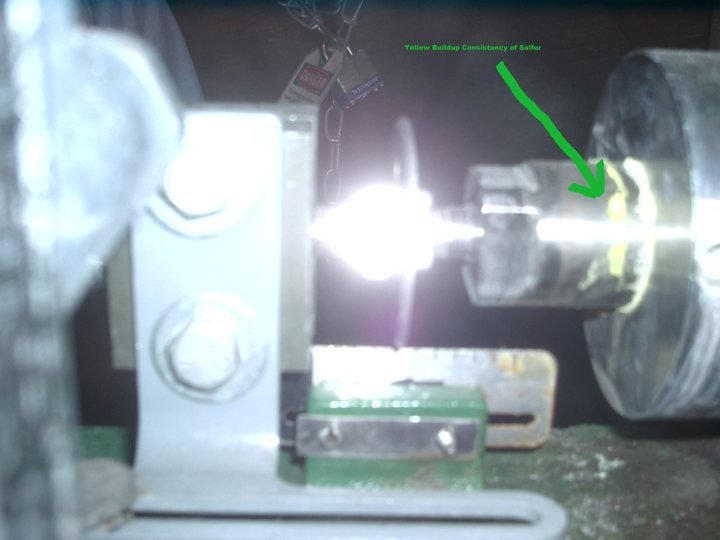 Bore under a work light with the defect marked. Annotating on the photograph, at the machine, while you can still see what you meant.