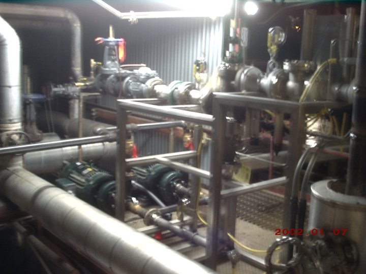 The reality of the environment — everything crowded, everything hot, and every valve someone's idea of accessible.
