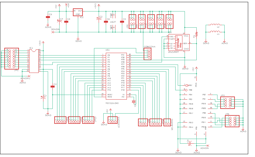 What the bench photos above actually are. 8051-family MCU, I²C EEPROM for patch storage, regulated supply, LCD and the header breakouts that became those rows of pots — with analog and digital grounds run as separate nets and tied at one point.
