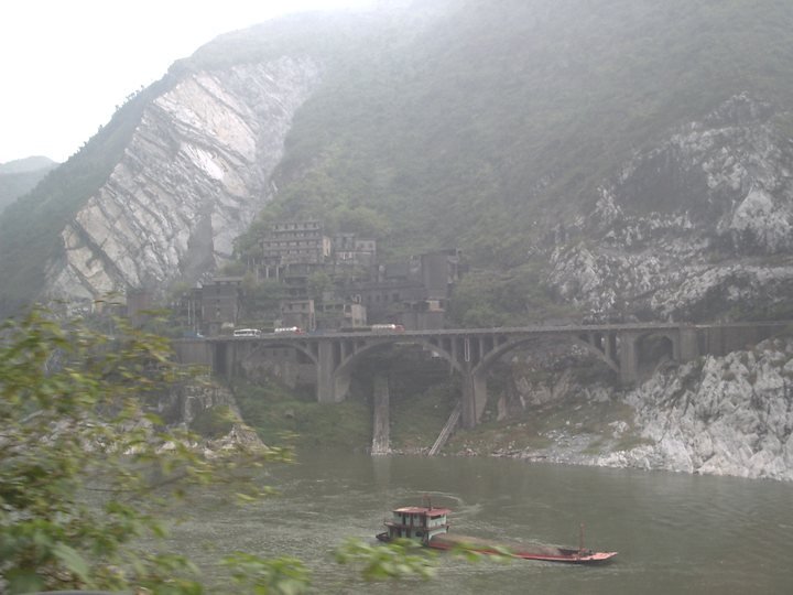 China, in the rain. The scale of the place does not come through in a photograph and I have stopped trying.