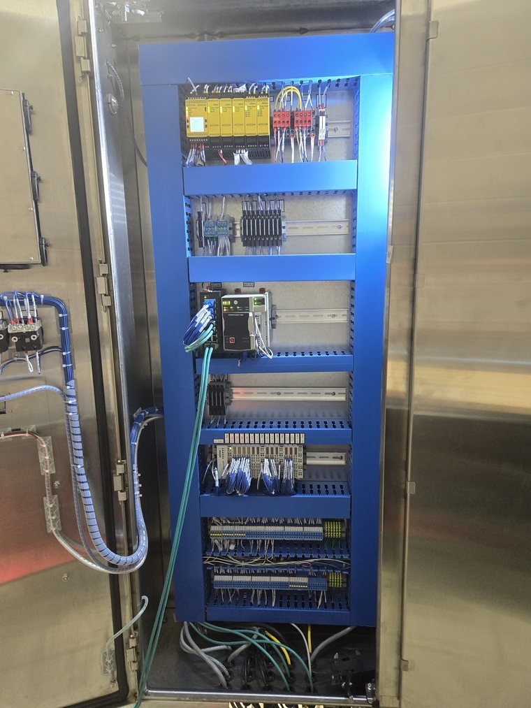 Cell panel. Everything the arm needs that isn't in the robot controller.