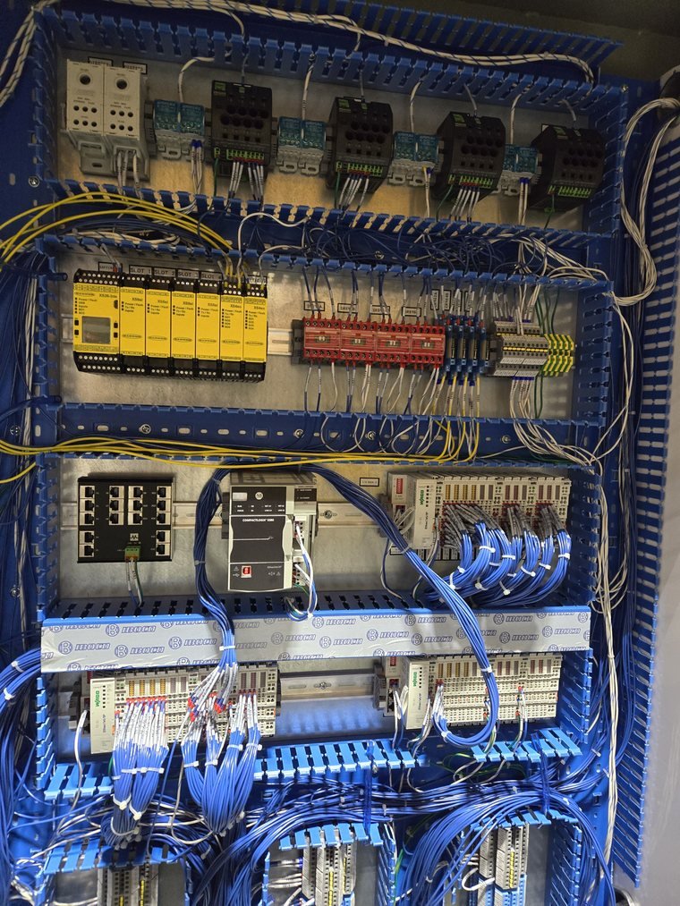 Interior, blue duct, drives and distribution. Built for the technician who opens it at 2am.