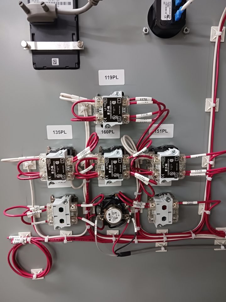 Motor starter section. Red duct keeps the control voltage visually separate from everything else.