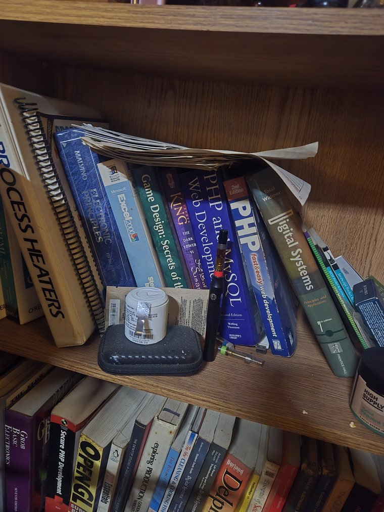 Shelf of web development, audio and electronics references